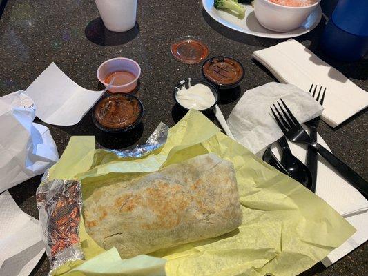 BYO burrito. Chicken, black beans, rice, onion, cilantro, lettuce. Salsa/sour cream on side. Decent but bland. Chipotle is way better!