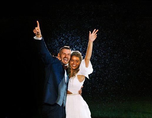 when it starts to rain on your wedding day, we celebrate!