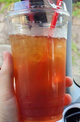 Kid's black iced tea with honey.