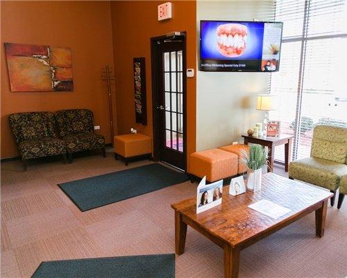 Relax in our reception area featuring comfortable couches, natural lighting, and soothing music.