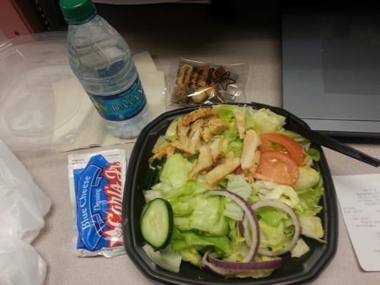 Grilled chicken salad ($4.99) + bottled water ($1.49)= lunch. Why does blue cheese dressing have 320!!!! Calories?? Wow.