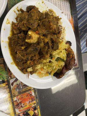 Curry goat over rice