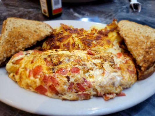 Monster tomato and feta omelet