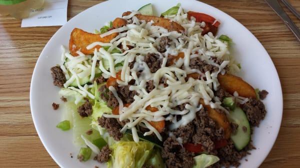 Steak and fries salad is yummy