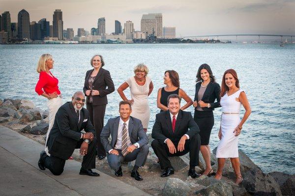 Our team in 2012 - Photo shoot on Harbor Drive. We live in such a gorgeous place - can you see why we are all smiling?