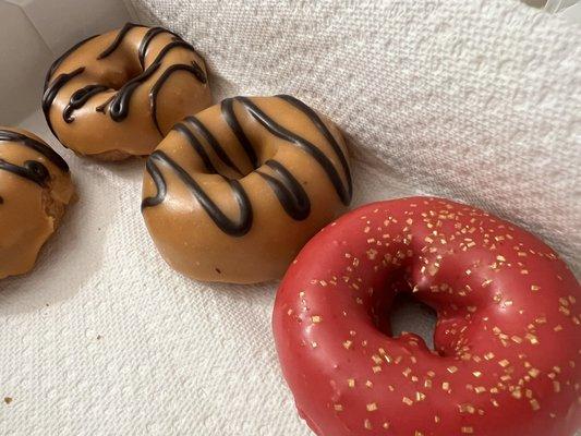 Tiger stripes/banana caramel donuts, raspberry sprinkles donuts