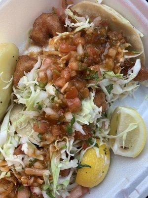 Shrimp tacos. I tried to take a picture of the carne asada tacos but my daughter went savage and ate them too fast.