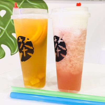 Left to right: Orange Passion Dark Oolong Tea (half sugar) and Watermelon Slush with Jasmine Tea Milk Foam (no sugar)