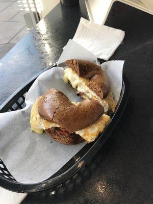 Pumpernickel bagel with bacon, mozzarella, and egg whites