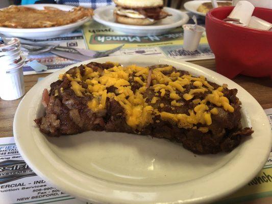 Corn beef hash laces with lots of other breakfast meats.