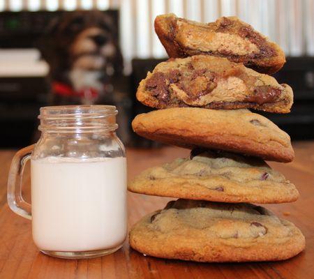 Peanut Butter & Fluff Chocolate Chip Cookies! PB & Fluff Nougat stuffed in the center of our thick & chewy chocolate chip cookies!