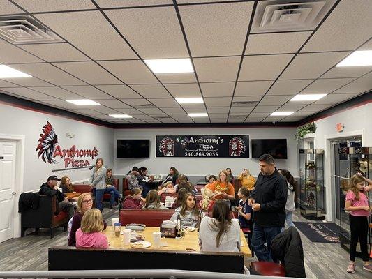 Here is a picture of our soccer team using the back room to host our end of year party.  Thanks again Anthony's!