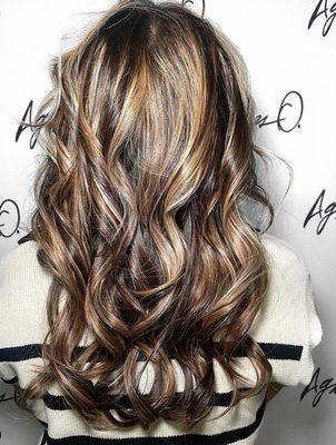 Get ready to be dazzled! Gildas works his magic with breathtaking highlights and curls on this beautiful client.