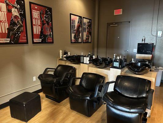 Hair washing area with massage chairs