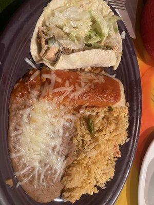 Combination Dinner with Shredded Chicken Taco, cheese enchilada, rice and beans