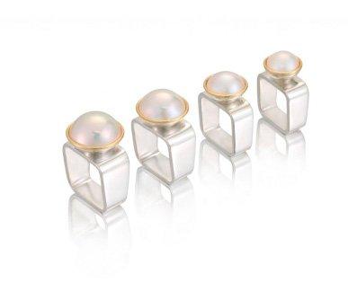 Our white Mabe pearl square rings.