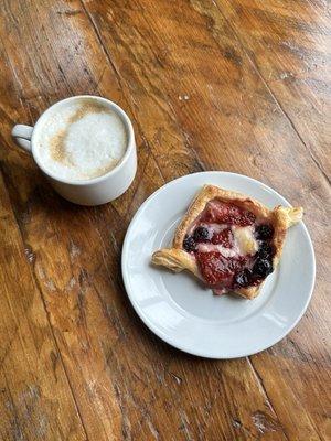 Mixed berry danish and a cappuccino