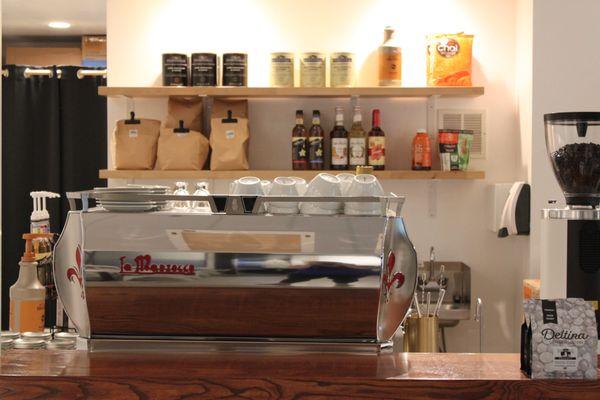 Picture of the expresso machine and coffee bar