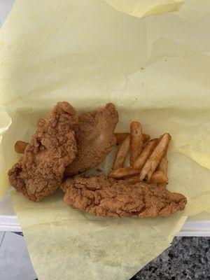 Chicken strips with what's left of the crispy fries (they're SO good!)