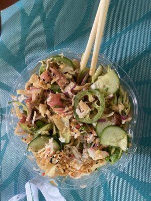 Brown rice, tuna, jalapeños, cilantro, red onion, zucchini, crab meat, sesame seeds, cucumbers drizzled with spicy and eel sauce