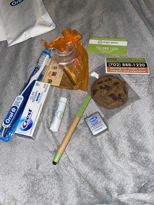 Free cookie,pen, magnet, floss, chapstick, & toothpaste/ toothbrush.  I got a whitening pen. (Came with the paid teeth whitening)