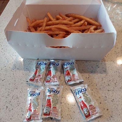 This is the $5.50 basket of fries with bacon ketchup  ordered for take-out. 6 packets of Heinz ketchup is NOT bacon ketchup.