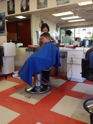 My son getting his monthly haircut at Mesa Hair.