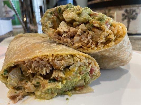 Chicken breast burrito with rice, beans, pico de gallo, guacamole, and cilantro cream salsa! This baby weighed 1lb and 13.8oz!