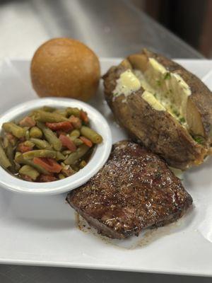 Friday special : steak night with baked potato, green beans and a roll of