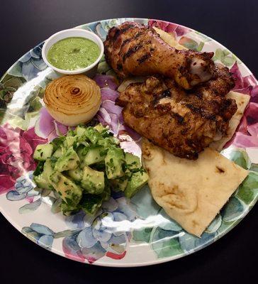 This week's special is Peruvian Grilled Chicken on Flatbread, Cucumber Avocado Salad, Seared Onion, and Peruvian Green Sauce.