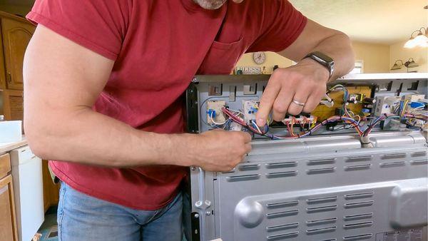 Replacing kitchen stove control switch for burner that kept getting stuck on