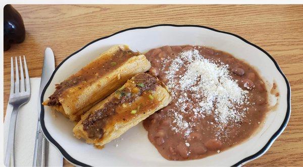 Two pork tamale with just beans