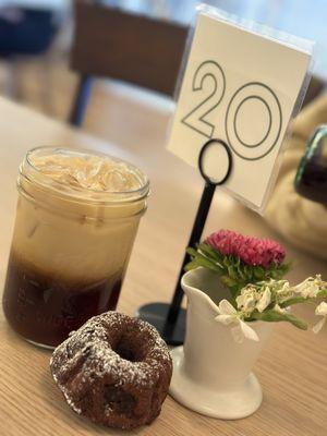 Cold brew coffee, house made vanilla syrup and a splash of oat milk, OMG  Banana chocolate chip Bundt gluten free