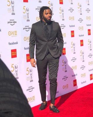 Music artist Sage Gemini sporting our signature tuxedo- at the 50th NAACP Awards. OMC Formal from head to toe actually!