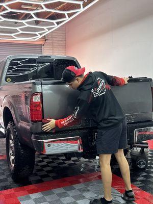 Detailing the exterior of the vehicle gettjng it ready for a Ceramic Coating.