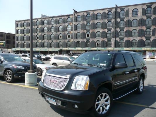 Black Denali, Red Hook Fairway in background.