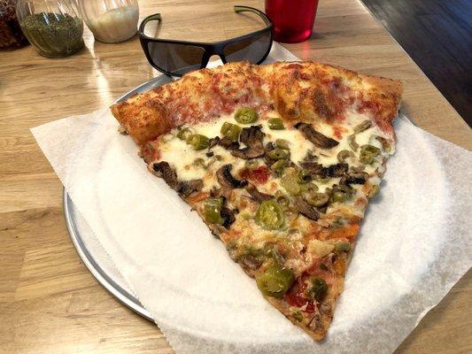 The slice of the day with giardinier, green olives, and mushrooms. Pretty large.