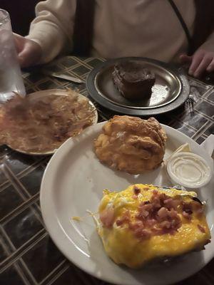 Fried Lobster, loaded baked and a Filet and hash browns