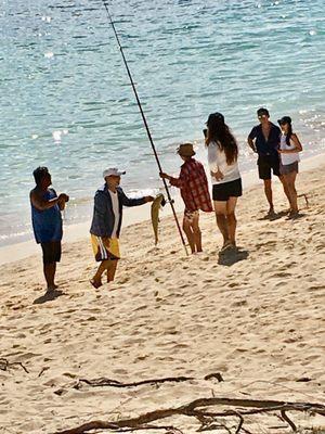 Catching fish off the beach