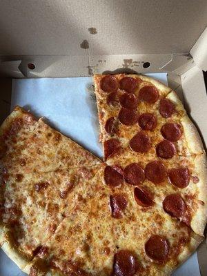 Pie pizza with pepperoni on one side