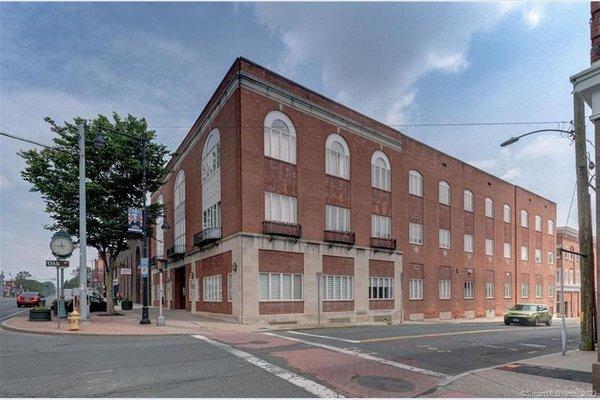 Watkins Center Builiding. Our office is street level at the rear of this inside the building