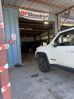 My jeep tires being fixed! Great spot English and Spanish !