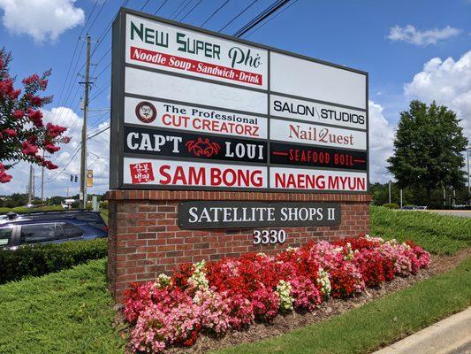 Outside. Satellite Shops II street sign. Cap't Loui is located in this strip mall.