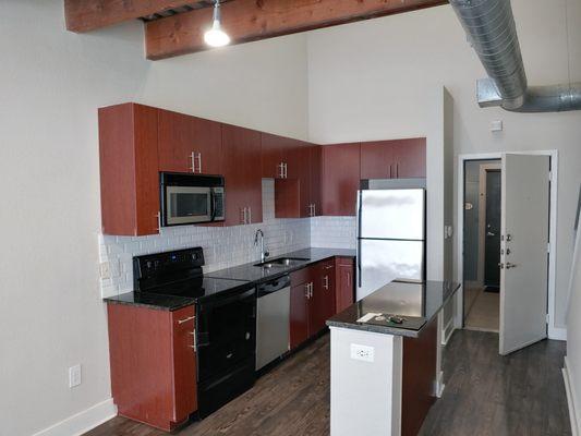 Love the kitchen backsplash, very city-feel