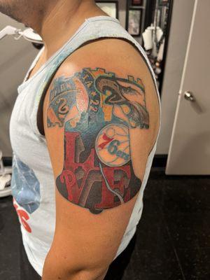 Sports logo tattoo by Alyssa