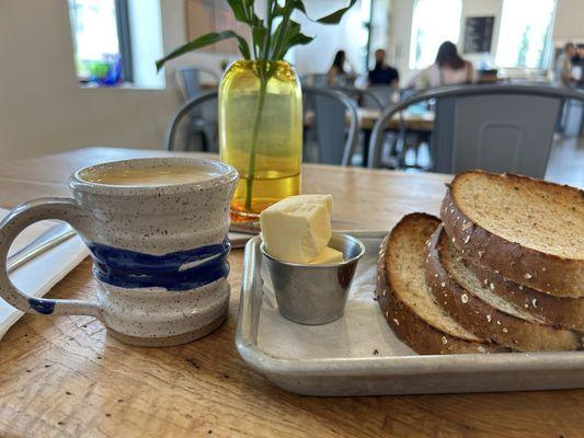 Toast and coffee in a house-made mug.