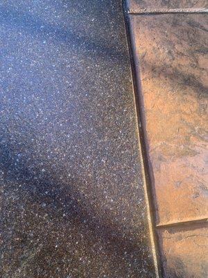 Close-up of the sidewalk. Isn't that a good match to the existing stamped concrete border?