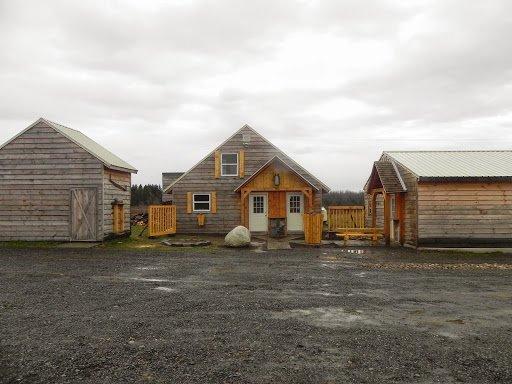 Our parking lot with our Store and Creamery