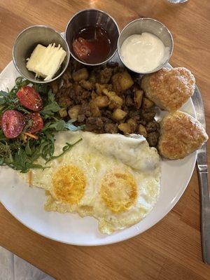 Potato hash (so flavorful!!), arugula salad, and scones with homemade strawberry preserves and cream!