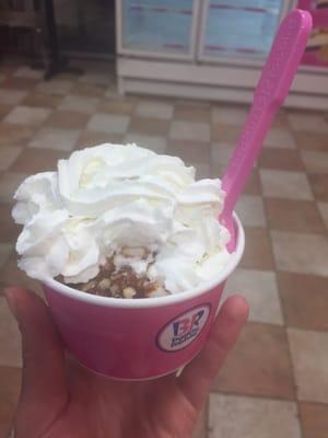 Nutty Coconut ice cream for National ice cream day with hot fudge and whip